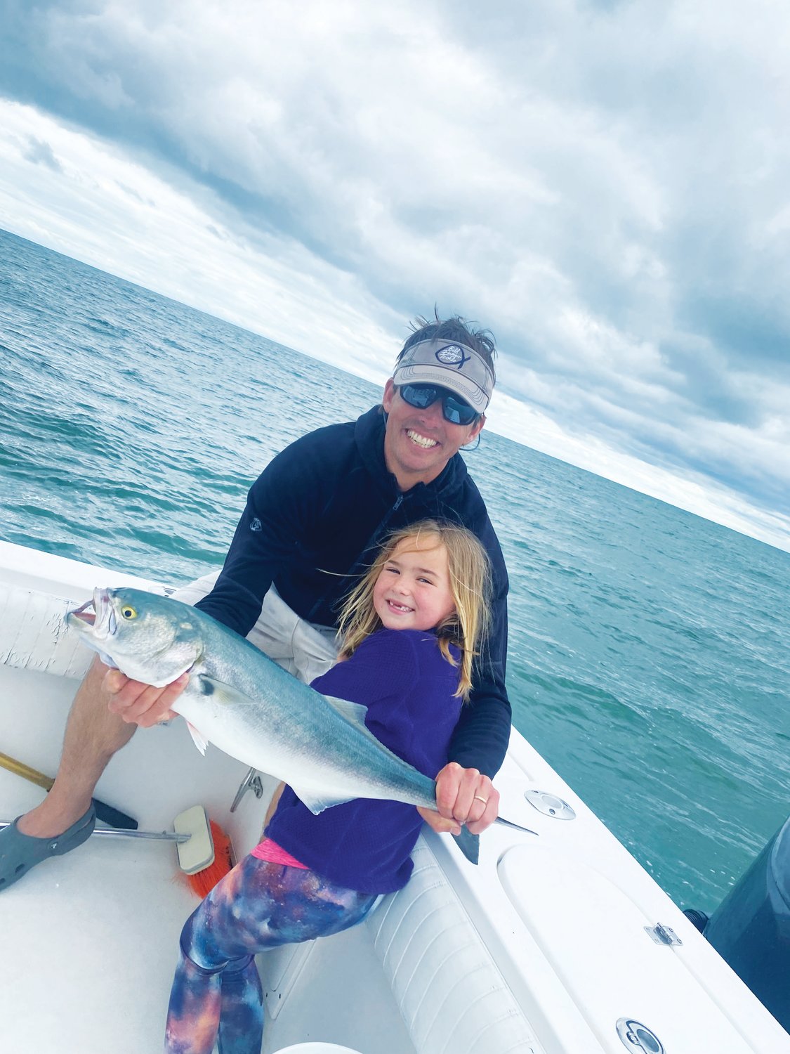 Blake and Cam Gammill with a bluefish they caught off the south shore this week.