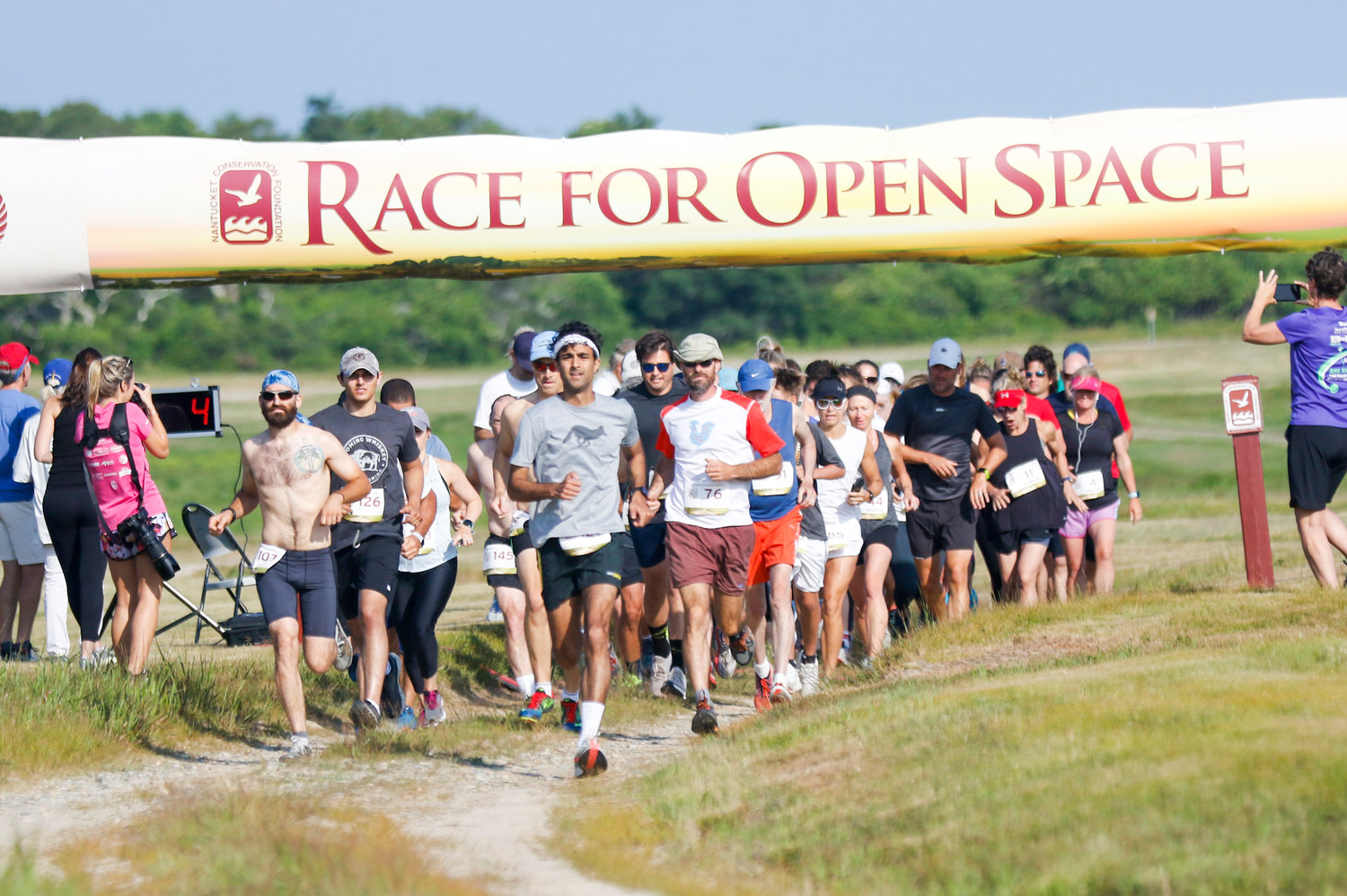 The start of the 2019 Nantucket Conservation Foundation Race for Open Space at the Milestone Cranberry Bog. Last year’s race was held virtually due to the coronavirus pandemic.