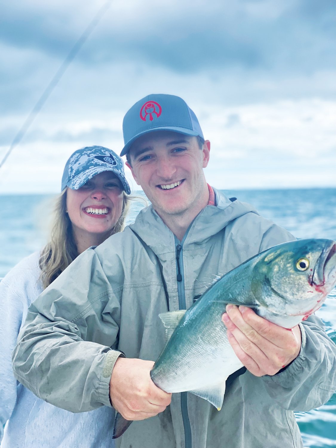 Barclay and Caroline Desloge with a big bluefish they caught on the south shore last week.
