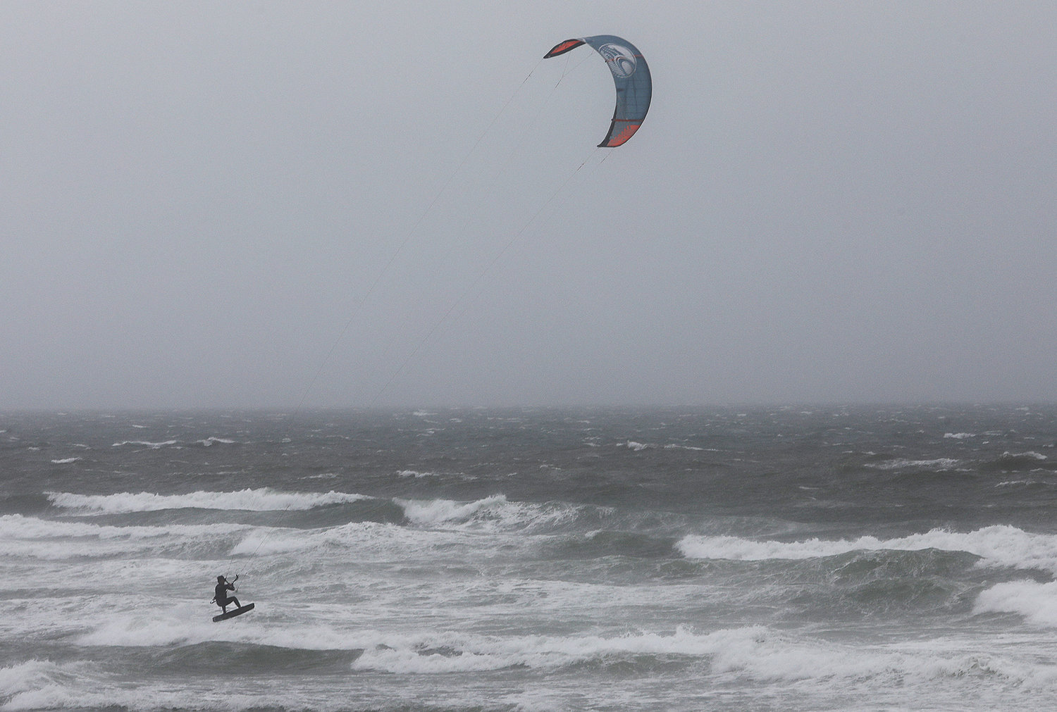 Kite surfers take advantage of the surf kicked up by Tropical Storm Elsa at Cisco Beach Friday, July 9.