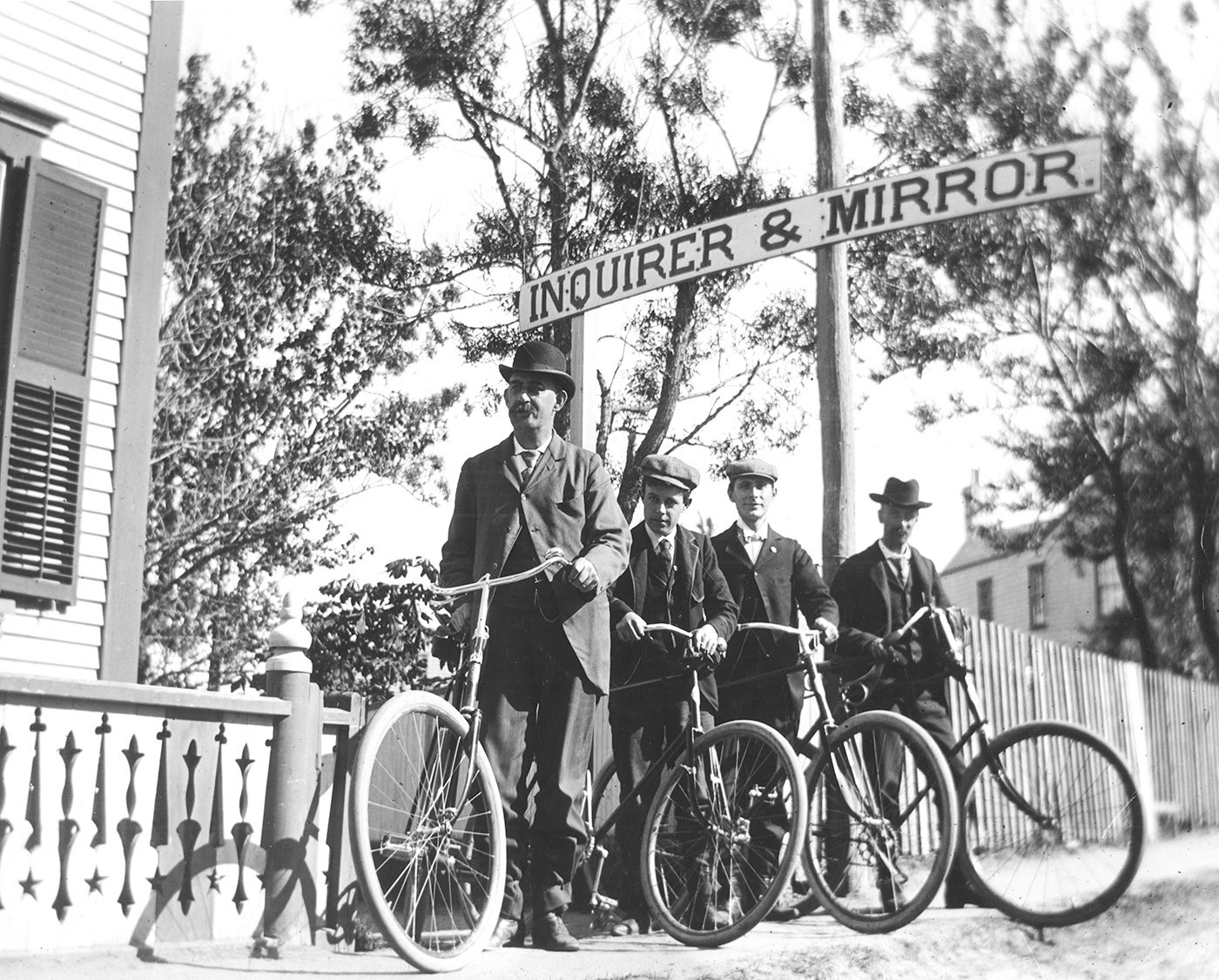 Inquirer and Mirror publisher Roland B. Hussey, 15-year-old Harry B. Turner, an unidentified friend and publisher Arthur H. Cook were part of a bicycle club in the early 1890s.