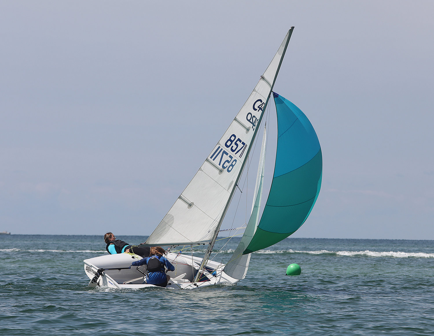 Heeling on a downwind leg during the first 420 race on Tuesday.