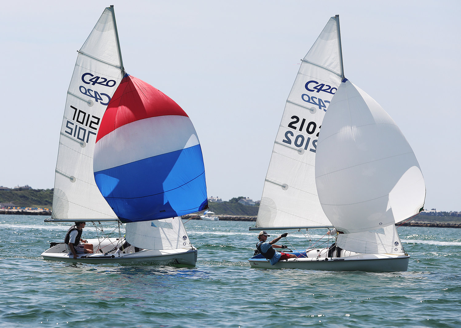 Spinnakers up on the downwind leg during the first 420 race on Tuesday.