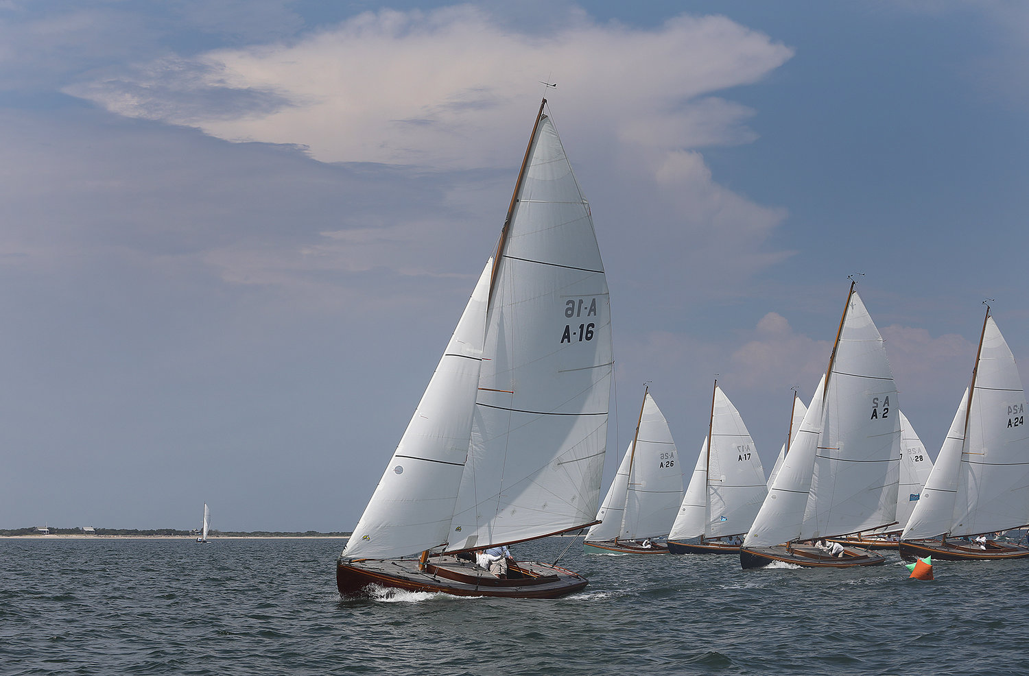 Alerions compete in the first leg of the One Design Regatta in Nantucket Harbor on the opening day of Race Week 2021.