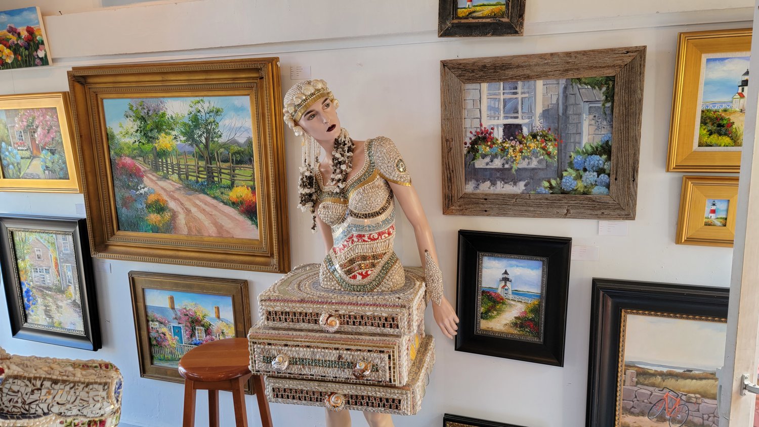 The Ireland Galleries are divided into two spaces: one for clothing, handbags and jewelry; the other for artwork, including Lorene Ireland’s paintings and signature mosaic pieces.