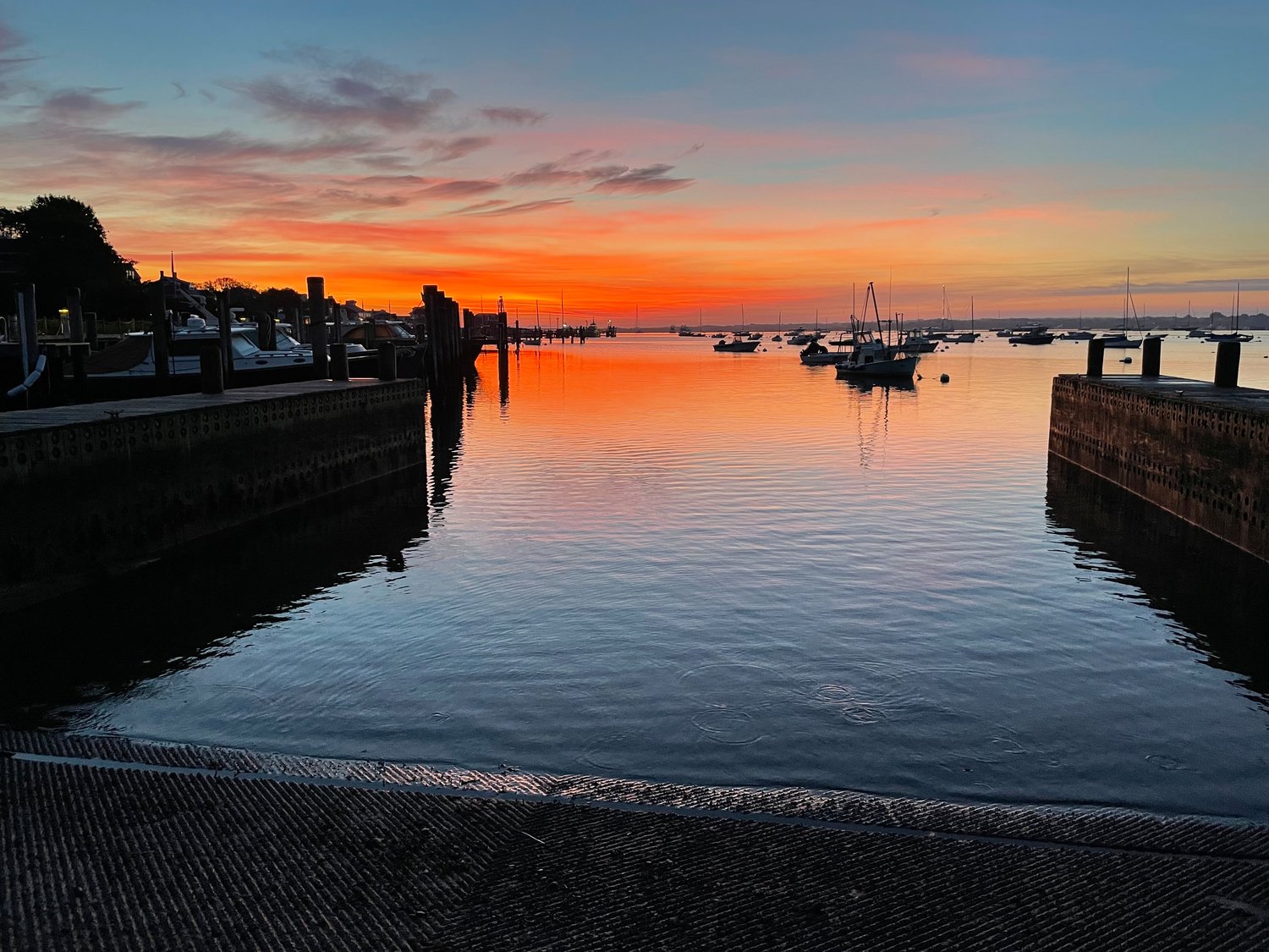 Red sky in the morning over Nantucket Harbor Saturday.