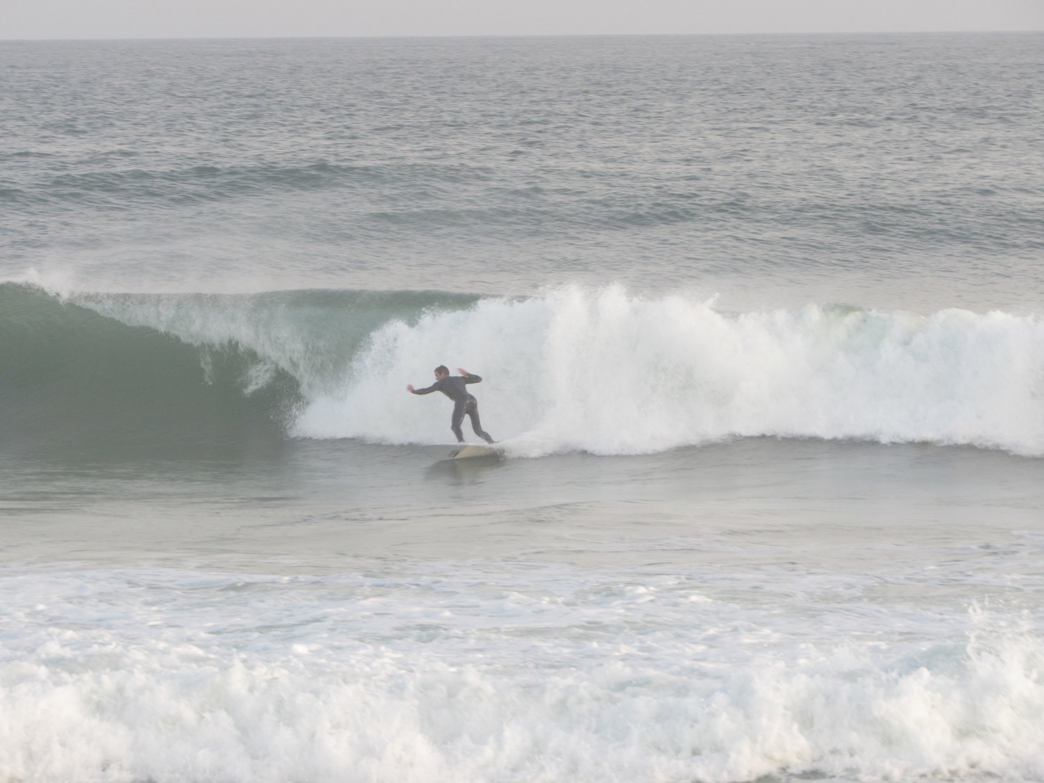 A surfer at Cisco Beach Saturday.