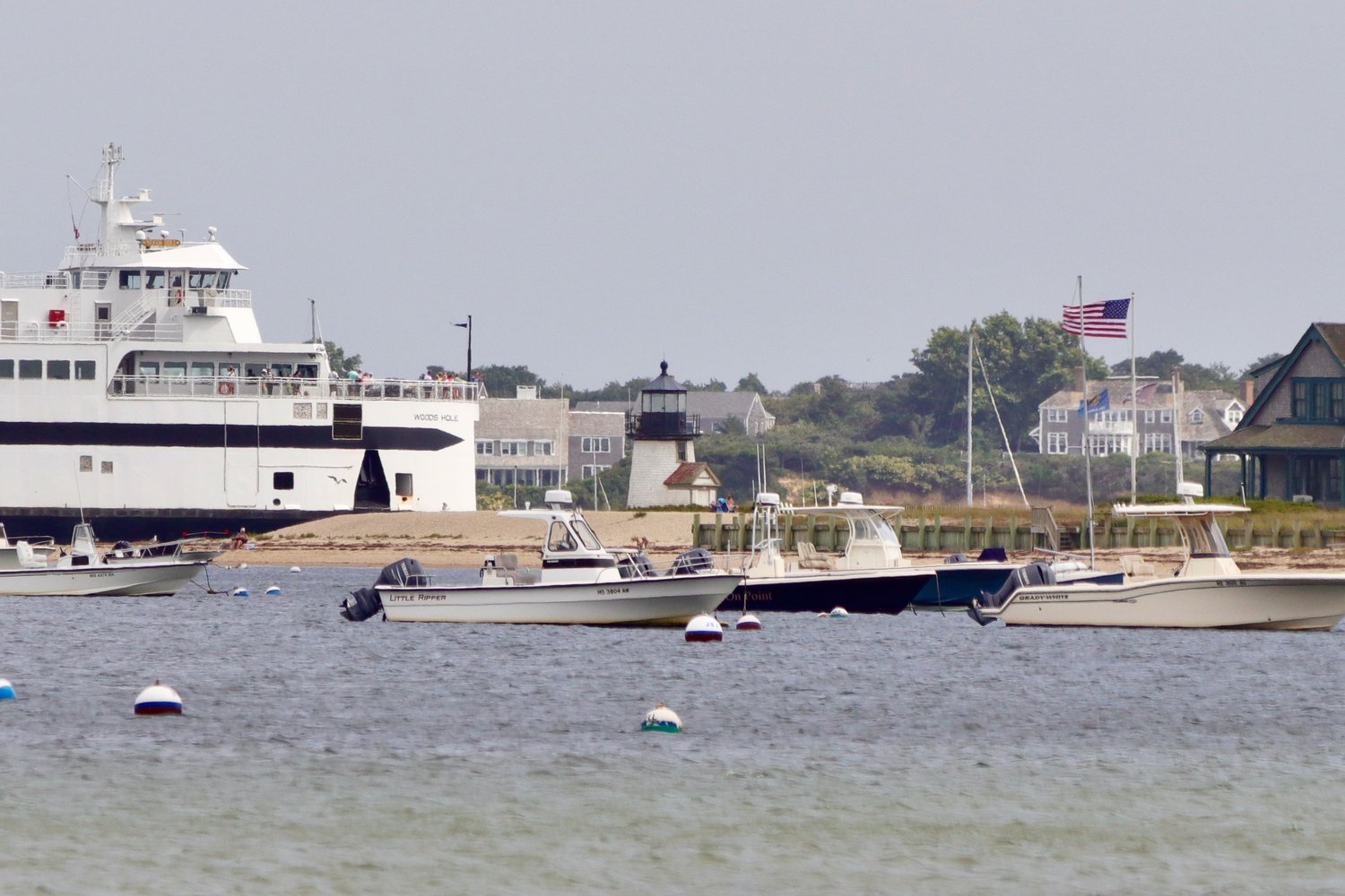 The Steamship Authority M/V Woods Hole rounds Brant Point Monday afternoon as seen from the channel side of Jetties Beach.