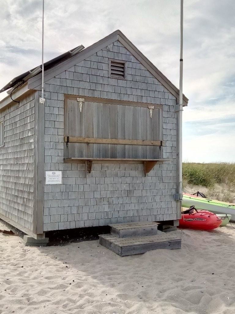 Nantucket Community Sailing's Jetties Beach rental shack boarded up for the season.