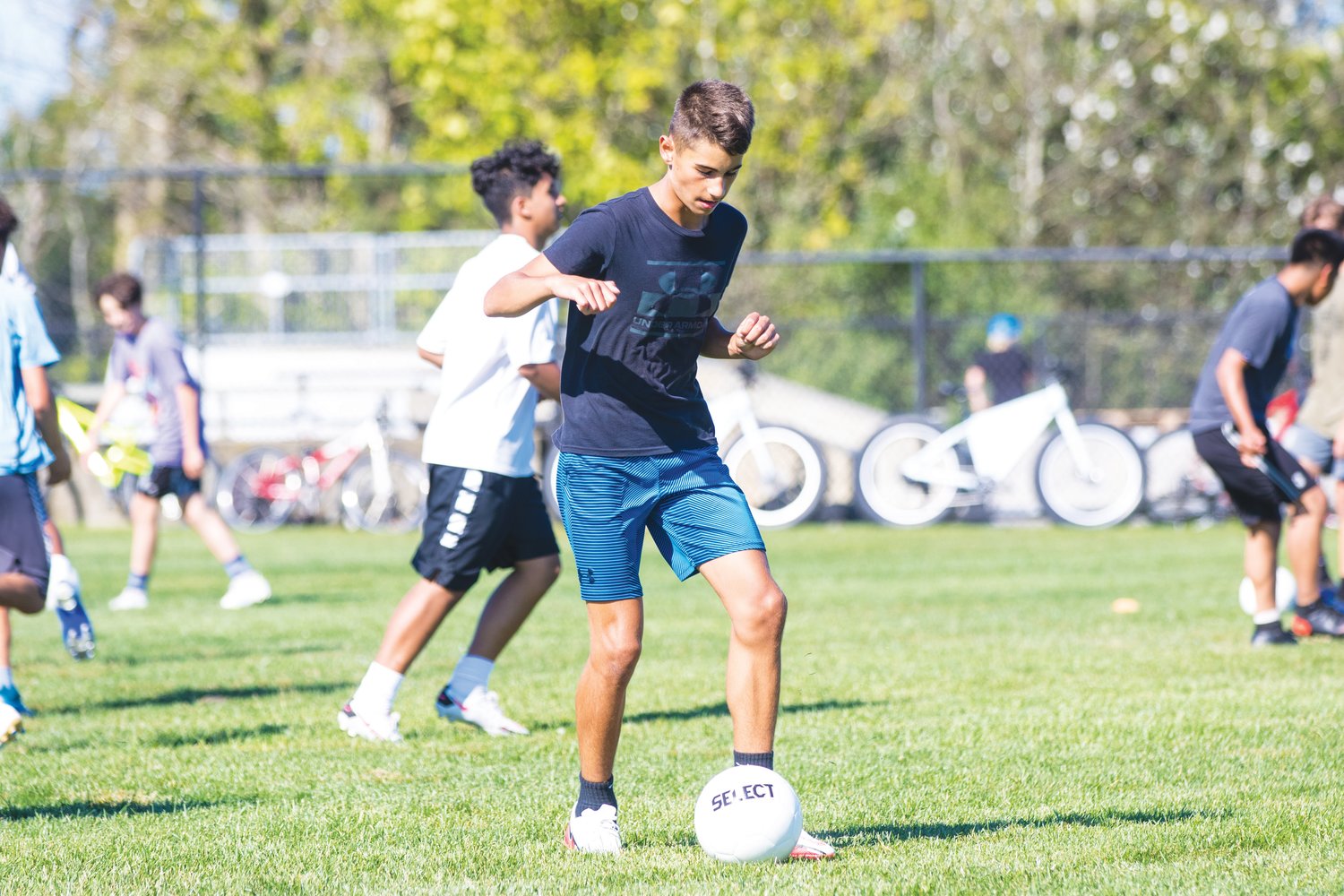 Alexander Ivilov works with the ball during boys soccer practice Tuesday. The team hosts Dennis-Yarmouth today.