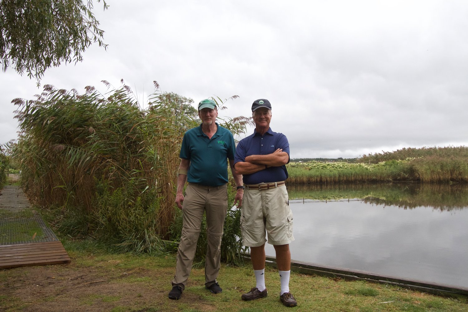 Ken Wagner and Bob Williams at the duck pond at Consue Springs, where the phragmites makes up approximately 95 percent of the vegetation, according to SOLitude.