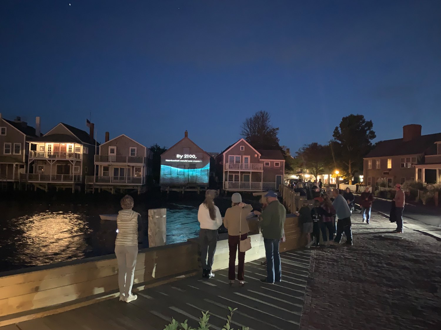 A pop-up art installation was unveiled Friday on the exterior of 4 Old North Wharf to raise awareness of coastal-resilience and climate change.
