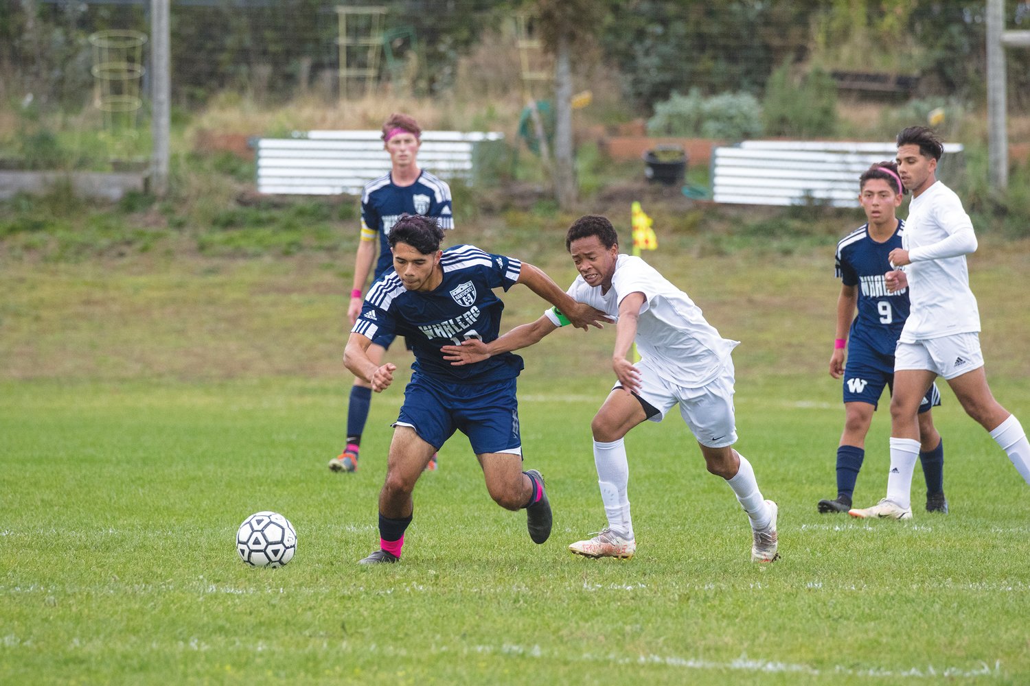 David Lemus Castro fights for the ball in a 2-1 win over Dennis Yarmouth.