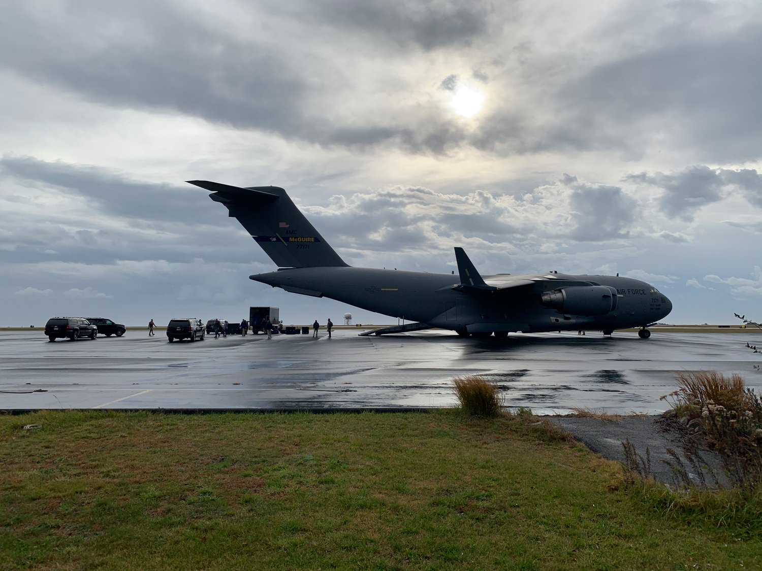 A U.S. Air Force cargo plane lands at Nantucket Memorial Airport Monday morning, unloading more vehicles and cargo in advance of President Joe Biden's Thanksgiving visit this week.