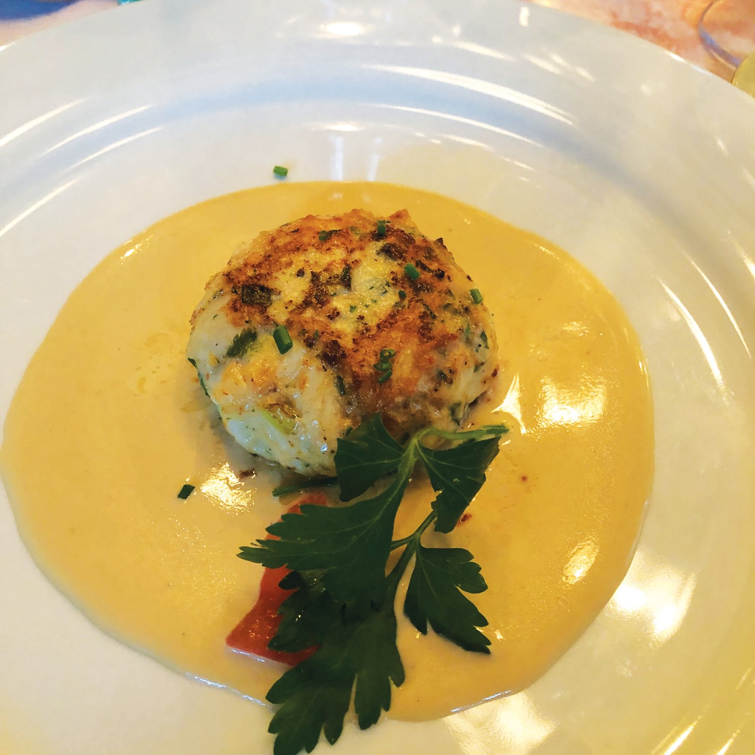 Crab cakes bound with a shrimp mousse and served with a mustard sauce were Club Car favorites.
