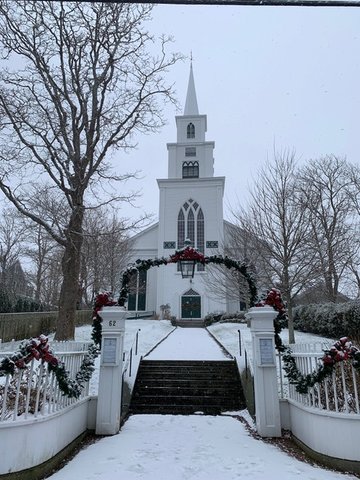The First Congregational Church under a blanket of snow.