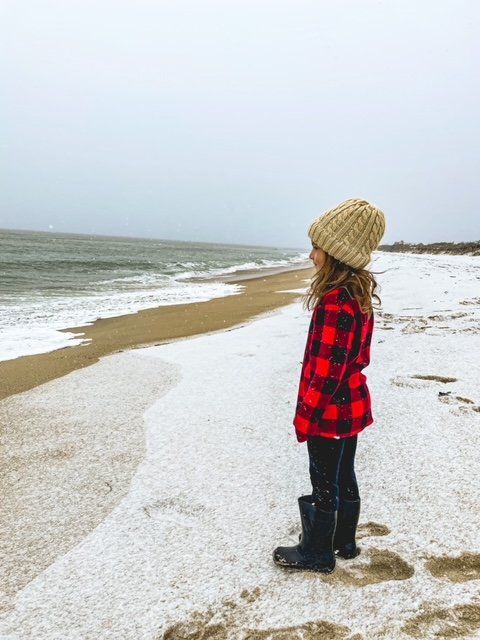 Jettie Evans enjoying the snow at Madaket Beach.