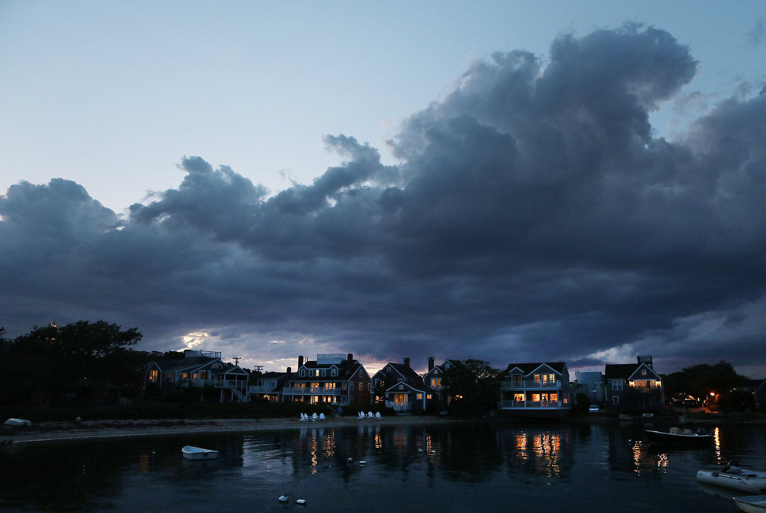 Storm clouds clear over Nantucket Harbor on a late July evening.