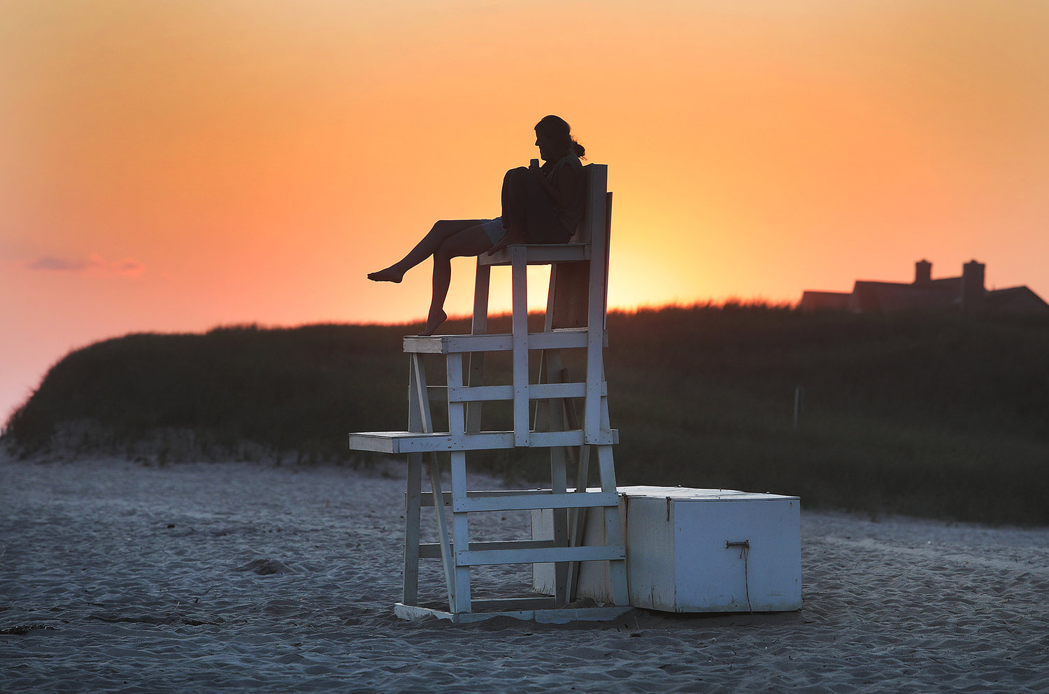 Enjoying the sunset from the Miacomet Beach lifeguard stand on an early August evening.