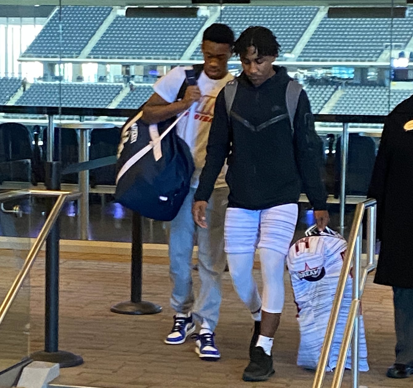Justin Bloise and Makai Bodden enter AT&T Stadium in Dallas.