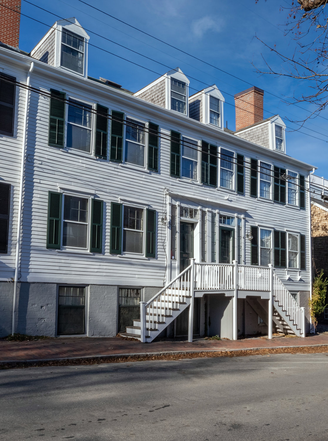Located just one block from historic cobblestoned Main Street, this antique six-bedroom, two-bathroom home is one of the Folger Block row houses built in 1831.