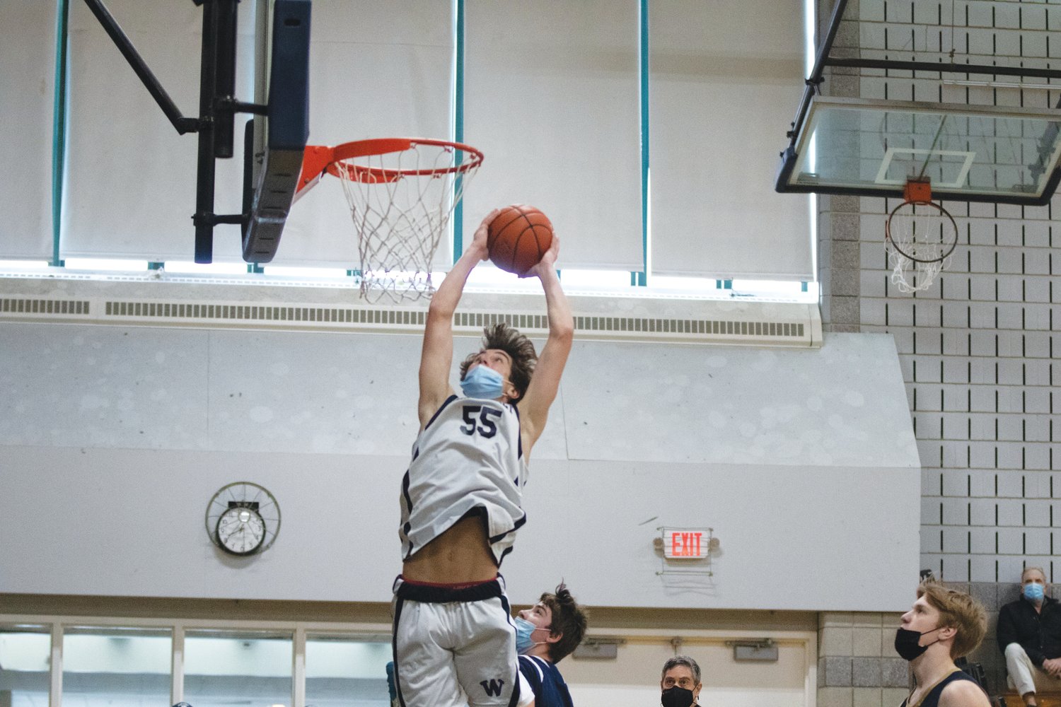 Jack Halik goes up for a dunk attempt against Tri-County in the Whalers' 69-25 home win on Sunday