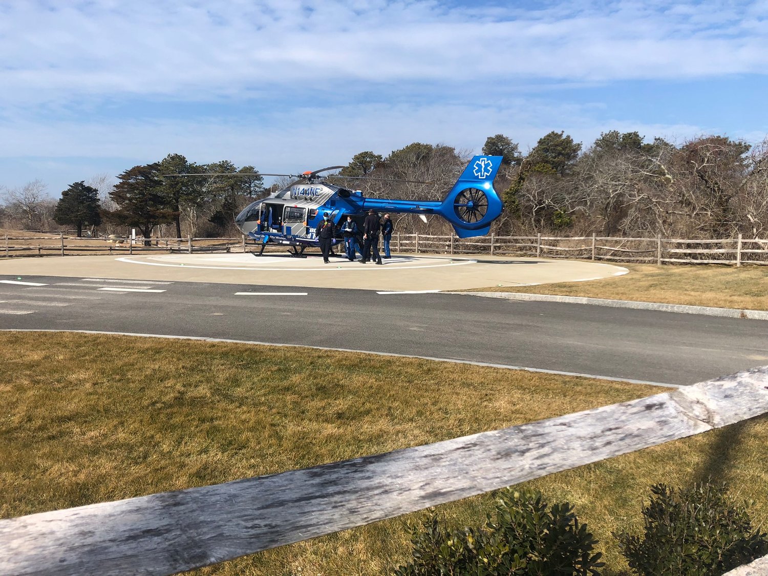 Boston MedFlight at Nantucket Cottage Hospital prepares to airlift a patient who fell from the roof of a Millbrook Road job site Saturday.