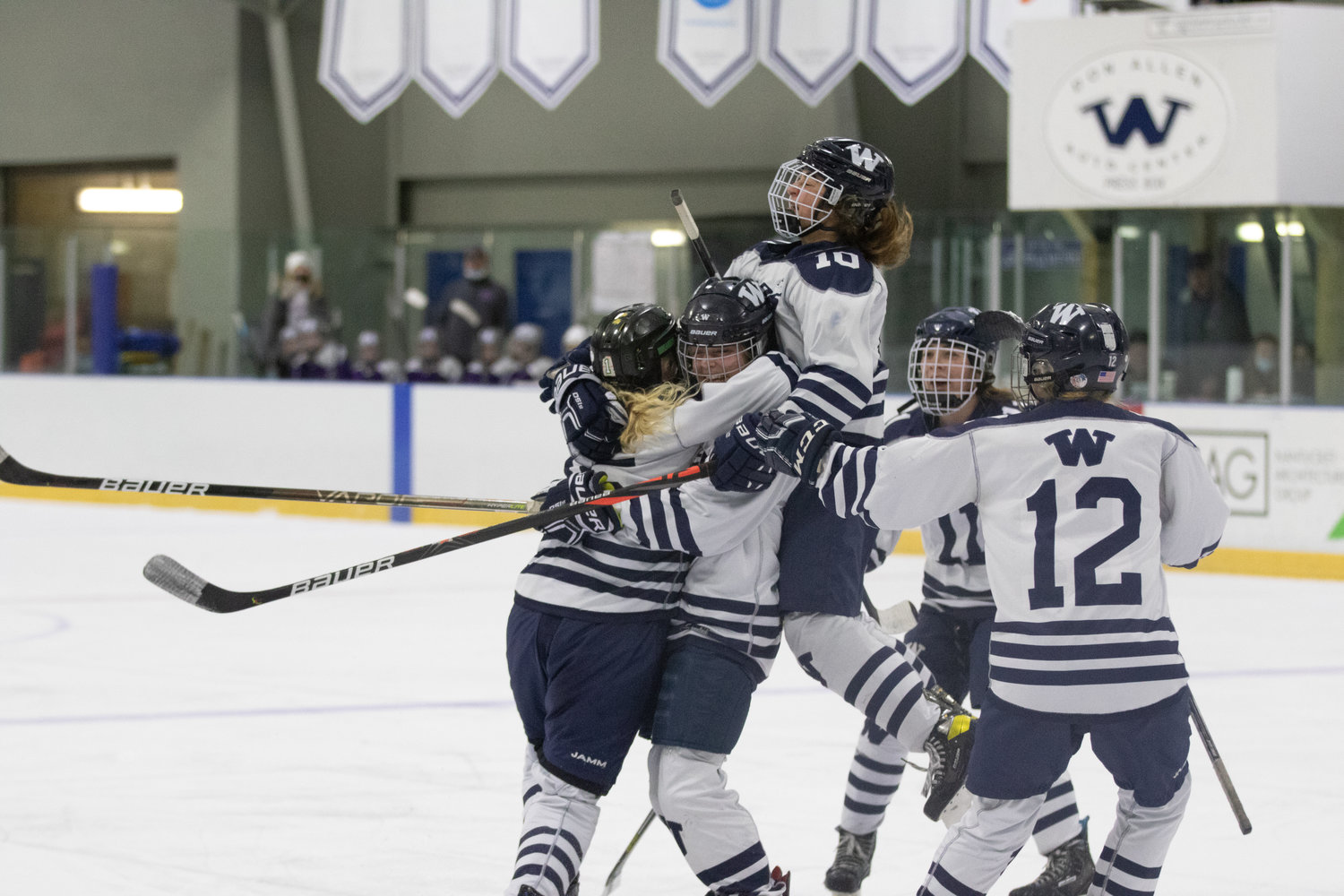Claire Misurelli jumps up to celebrate a Whalers goal over Martha's Vineyard mid-February.