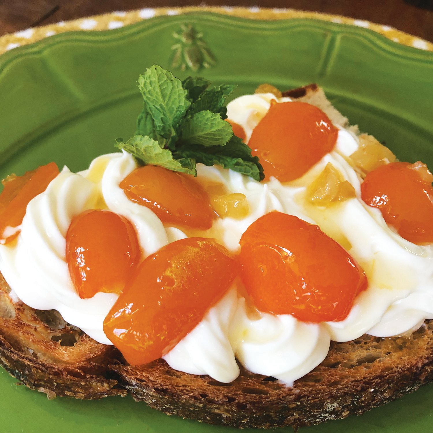 Candied kumquats and ginger make a sweet topper for a breakfast of whipped ricotta on toast.