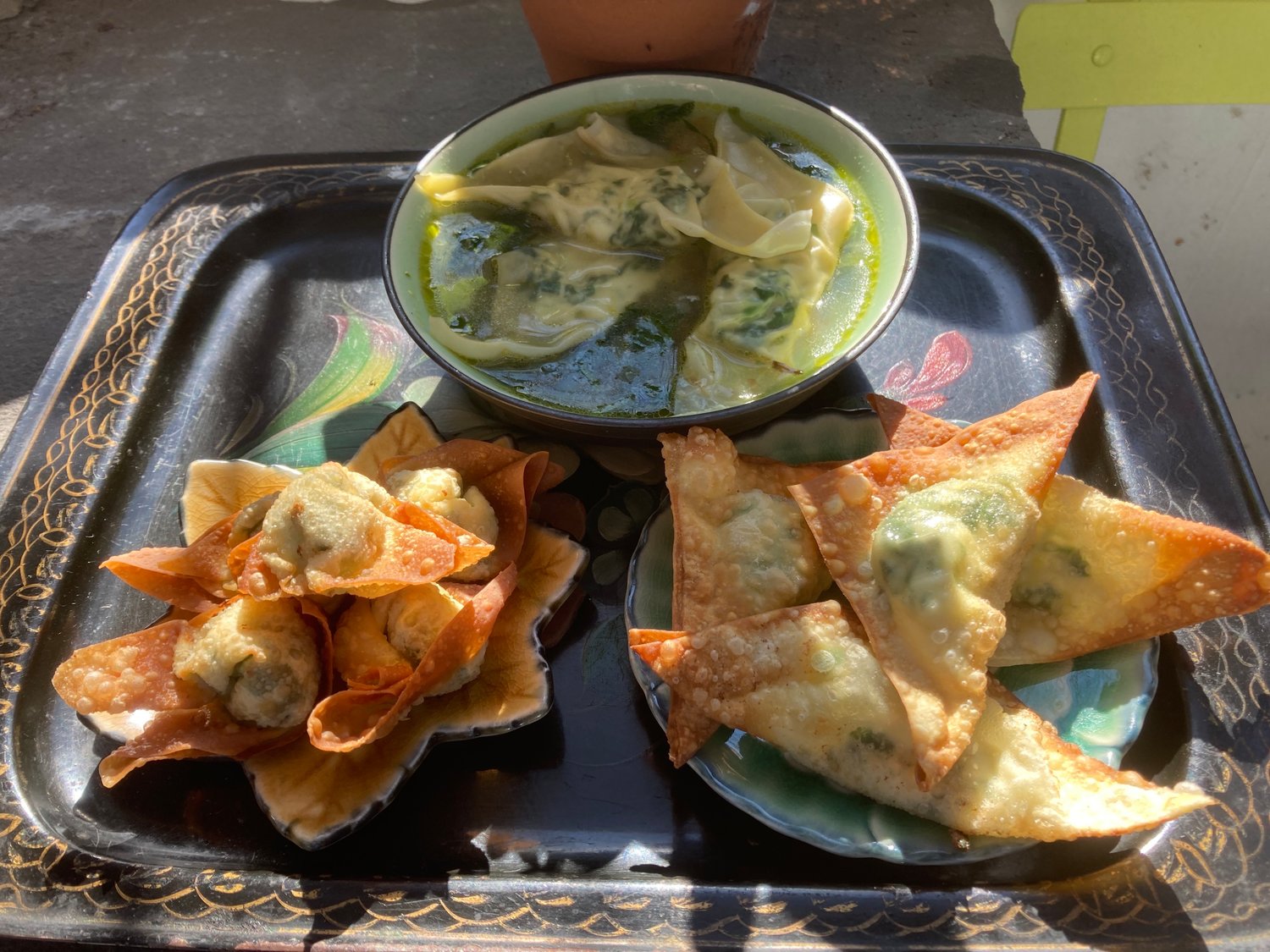Poached and fried kreplach – similar to dumplings, wontons and pierogies – stuffed with spinach, ricotta and scallions.
