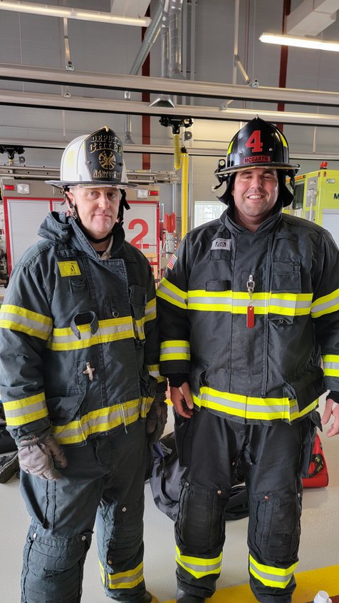 Nantucket firefighters Sean Mitchell and Mack McGrath wear the old turnout gear and the new gear with reduced PFAS.