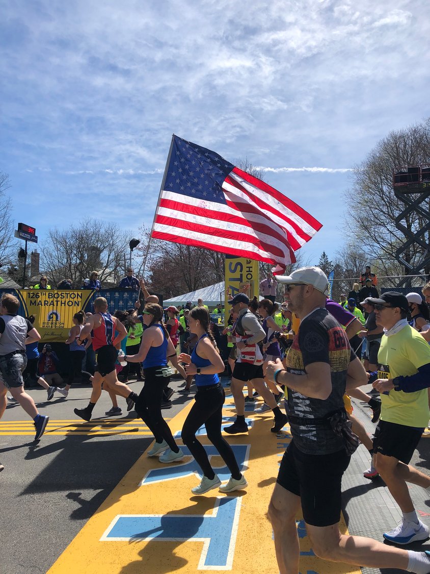 SCENES FROM THE STARTING LINE: Islander Barry Rector was a ham-radio volunteer at Monday's Boston Marathon.