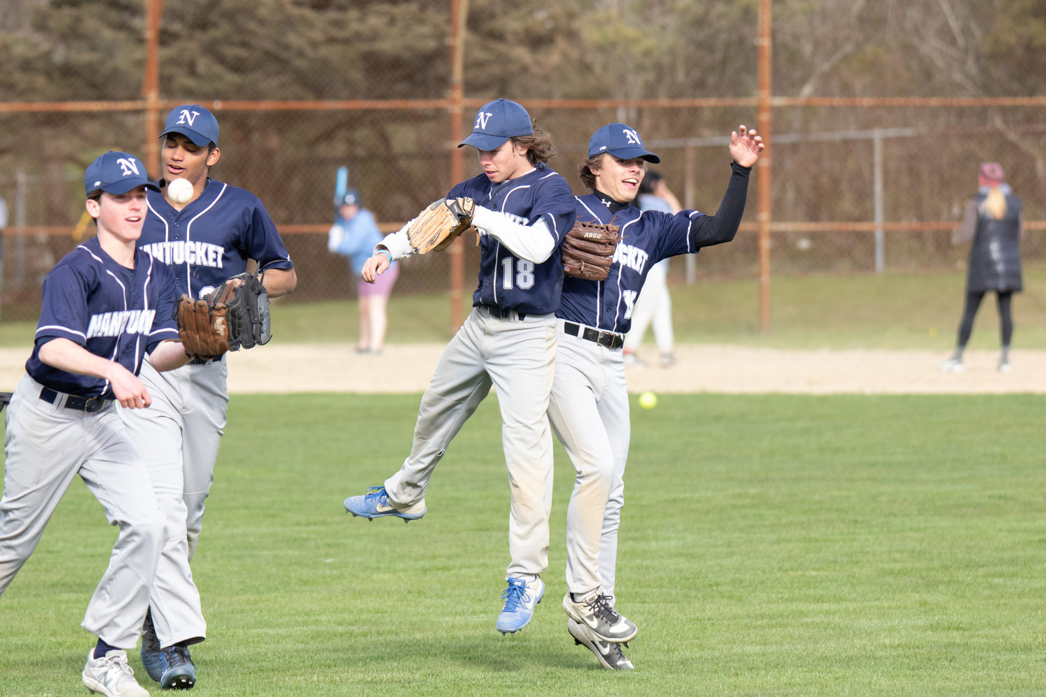 Garner Ray and James Mack celebrate the Whalers' first win of the season, 10-4 over Rising Ride