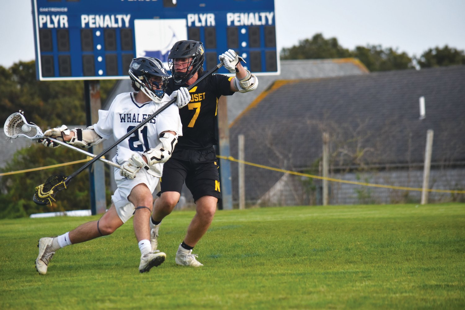 Colton Chambers battles a Nauset defender. Chambers led the Whalers in scoring against Nauset with four goals.