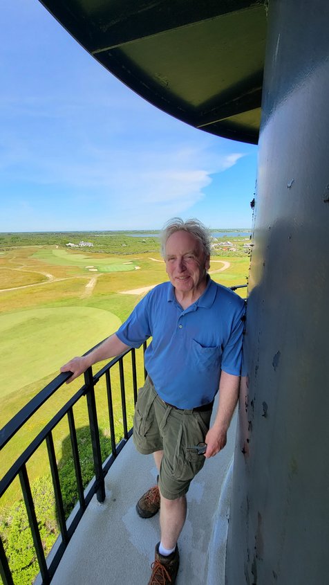 Rob Benchley, long-time Sconset resident, atop Sankaty Light, has made an old part of the light functional again.