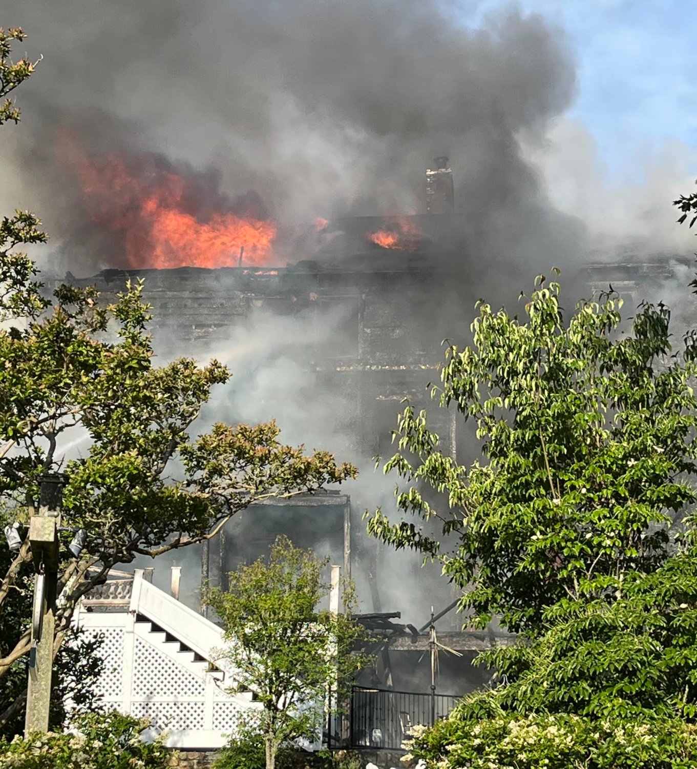 Flames erupt from the Veranda House.