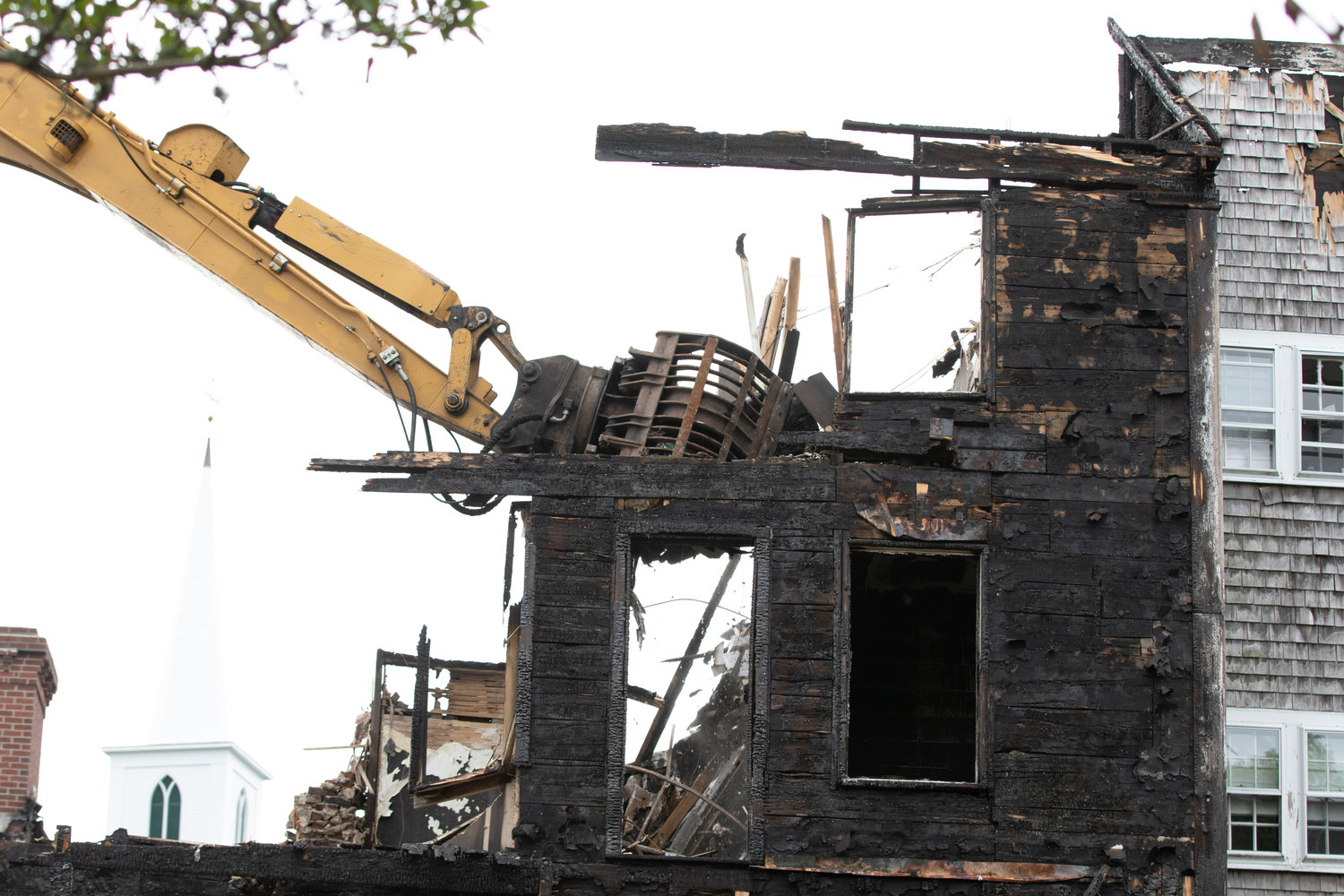 Demolition of the Veranda House hotel began Monday morning.