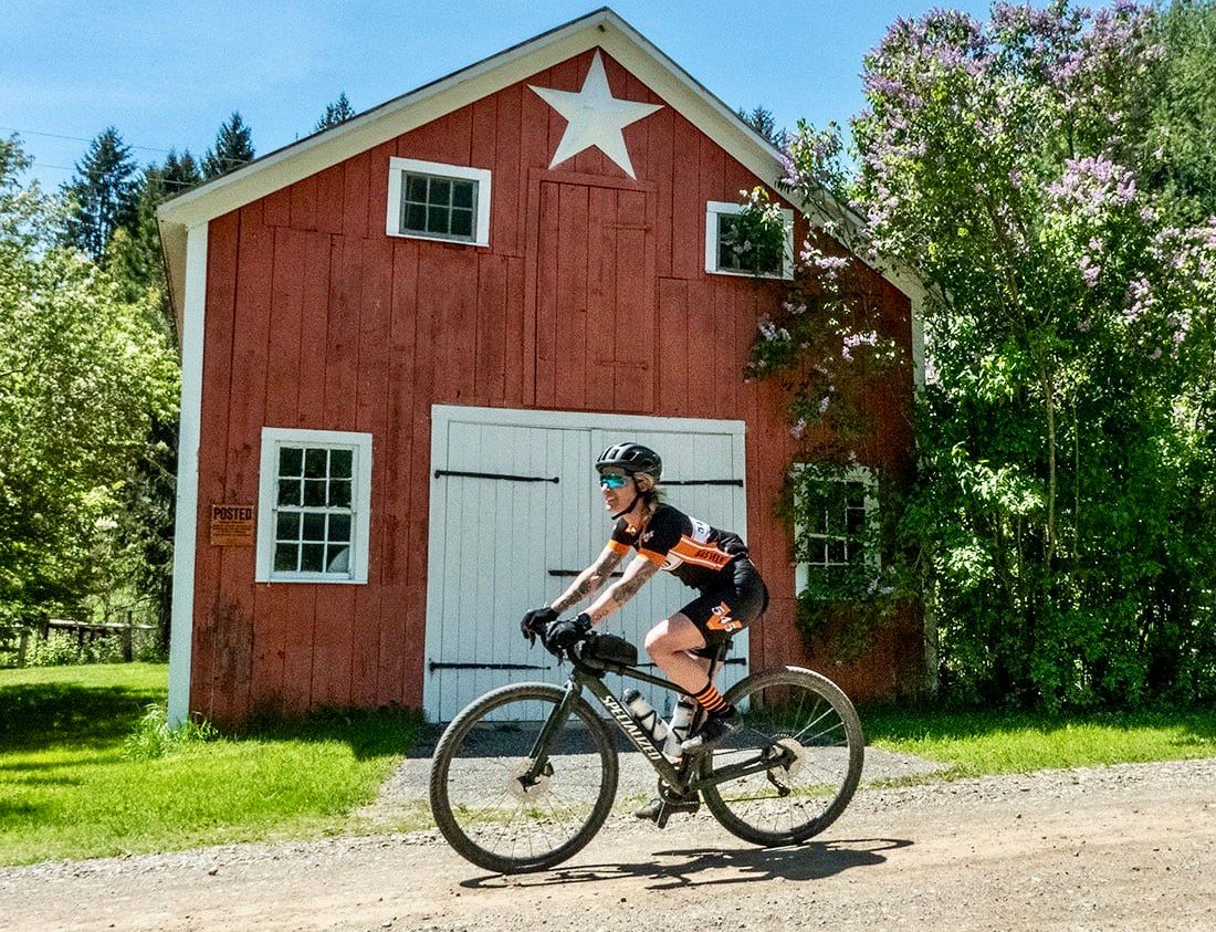 Caitlin Marcoux pedals through Cambridge, N.Y. on the 75-mile Great North Ride in April.