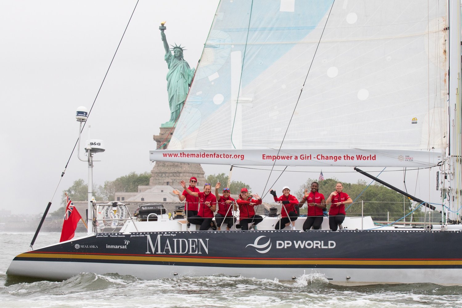 The crew of Maiden passes in front of the Statue of Liberty during their three-year world tour to raise awareness of education for girls.