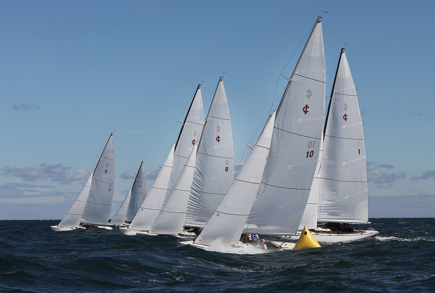 AUGUST 18, 2022 -- Nantucket Race Week. Day 6. Boats round a marker during the International One Design Celebrity Invitational in Nantucket Sound on Thursday. Photo by Ray K. Saunders