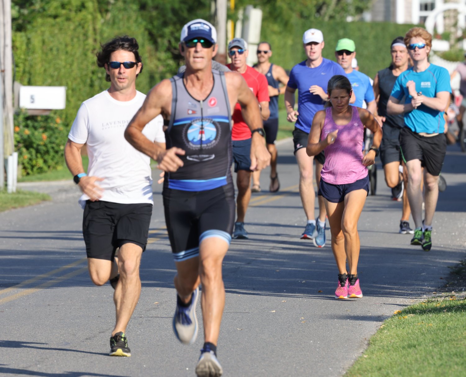 Jim Congdon leads the pack at Tuesday night's Brant Point Runners, but ultimately couldn't hold off Aidan McCormack.