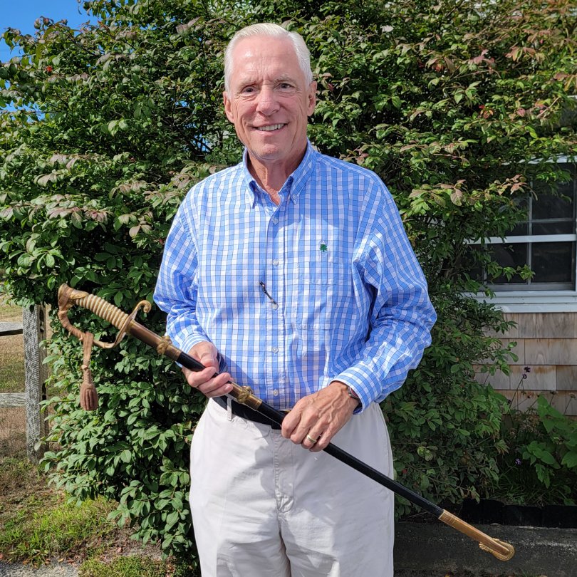 Ray DuBois with the commissioning sword of U.S.Navy CommanderJohn Walling, captain of the submarine USS Snook during World War II. Walling received the sword at his graduation from the U.S. Naval Academy. The sub went missing in the Luzon Strait off the Philippines in 1945.