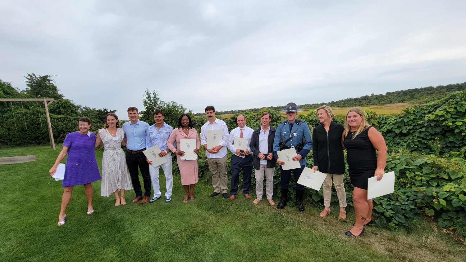 Nantucket’s 2022 Lifesavers Recognition Day was held Sunday. From left: Jessica Guff and Carlisle Jensen of the Egan Maritime Institute, state Rep. Dylan Fernandes, Peter Georgantas, Venessa Smith, Nate Barber, Nantucket police officer Joseph Tirone, Dan MacKeigan, state trooper Robert Clouse, Sheila MacKeigan and Jennifer Decker. The MacKeigans accepted the Maurice E. Gibbs Commendation Award on behalf of their daughter Sydney.