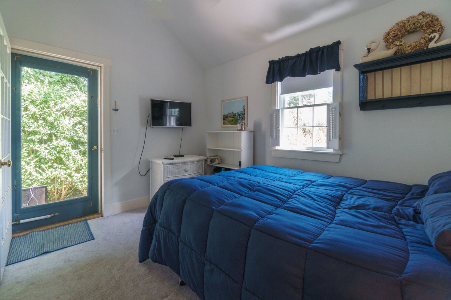 Each of the home’s two bedrooms have high ceilings and an en-suite bathroom.