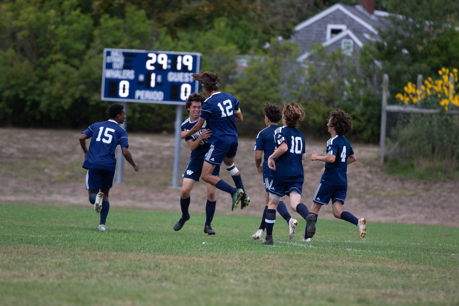 The Whalers celebrate the first of two goals scored by Ryan Coleman during Tuesday's match with Sandwich.