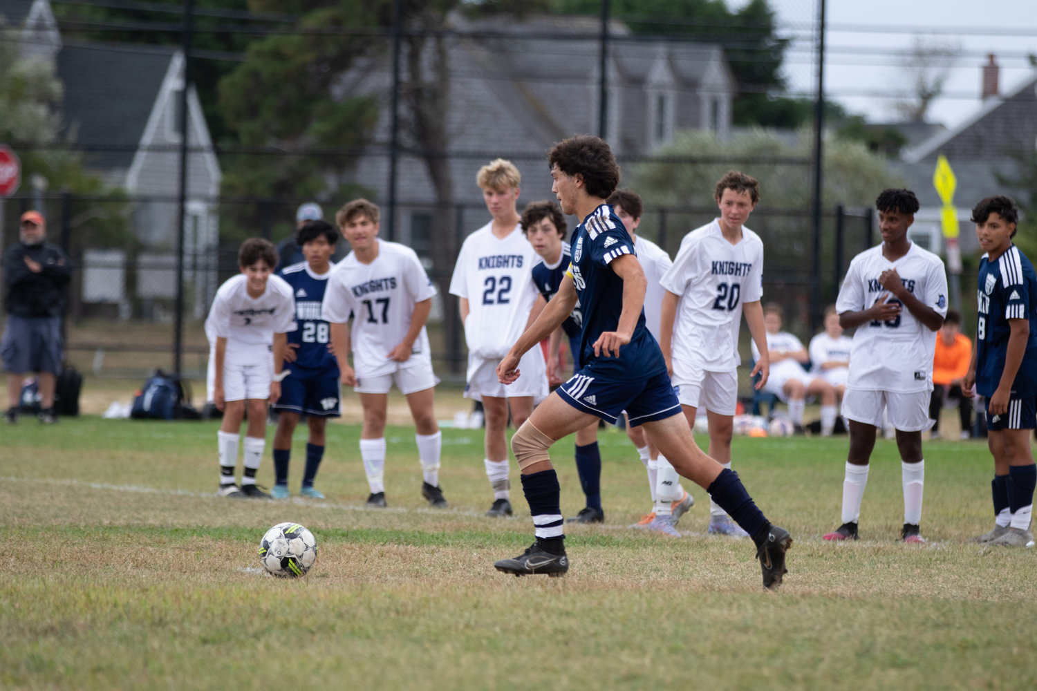 Treyce Brannigan lines up a penalty kick that the senior converted for a goal in Tuesday's match with Sandwich.