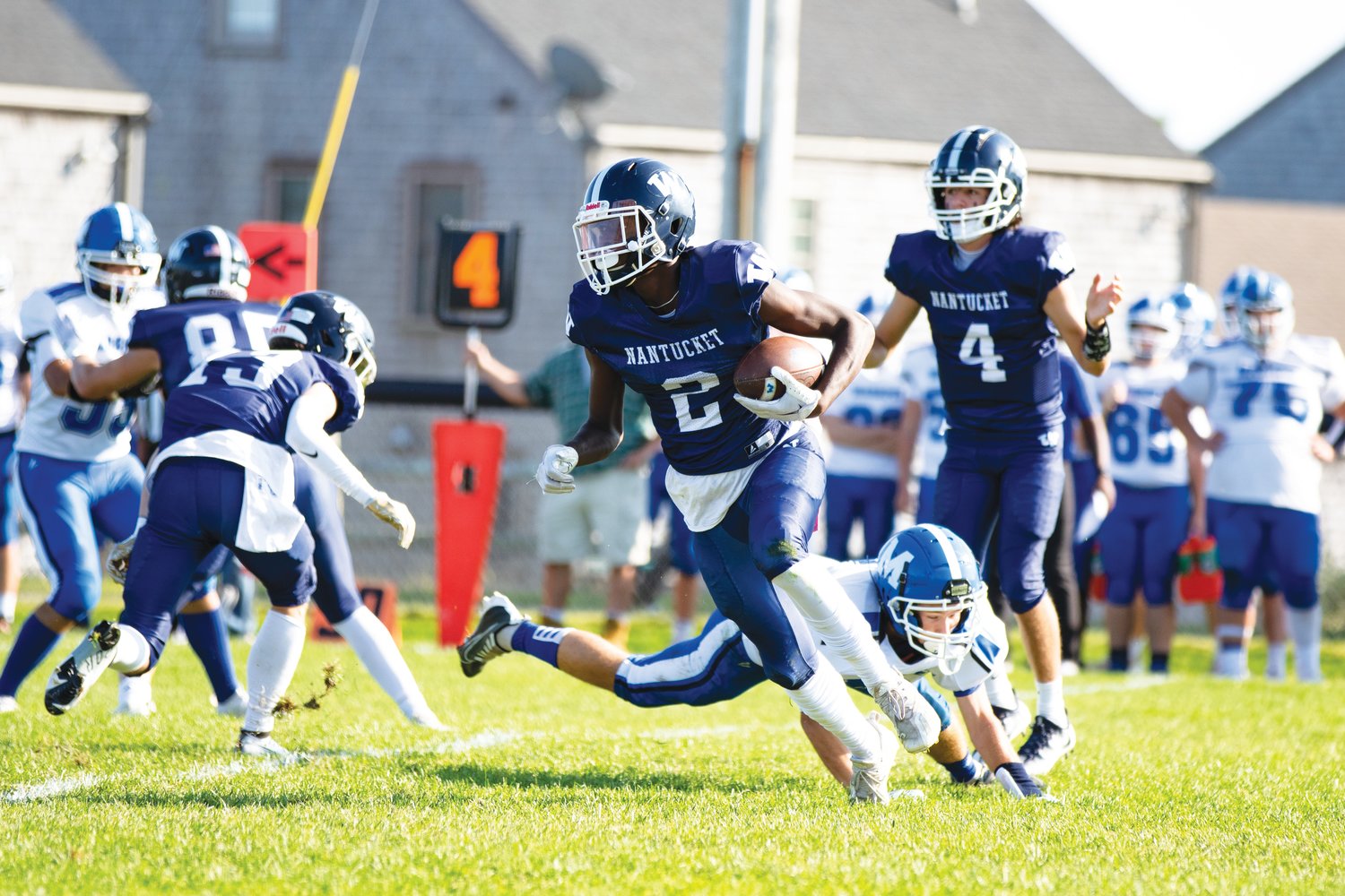 Jayquan Francis scores the Whalers’ first touchdown on a fourth-down play against Mashpee Saturday.