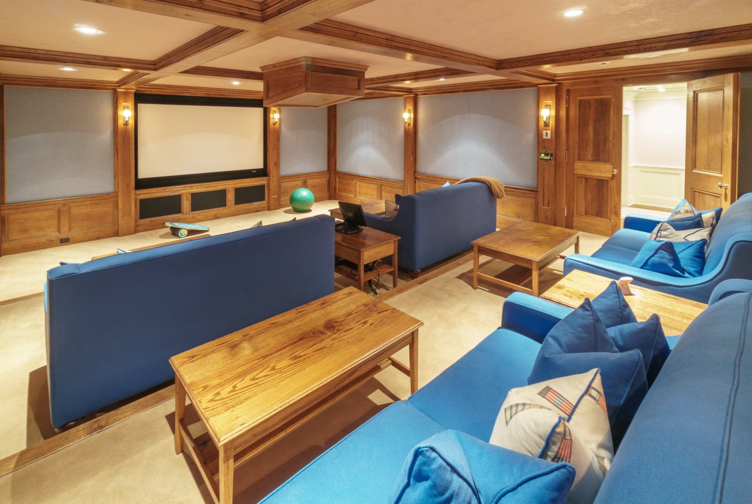 The three-tiered home theater has seating for 12.