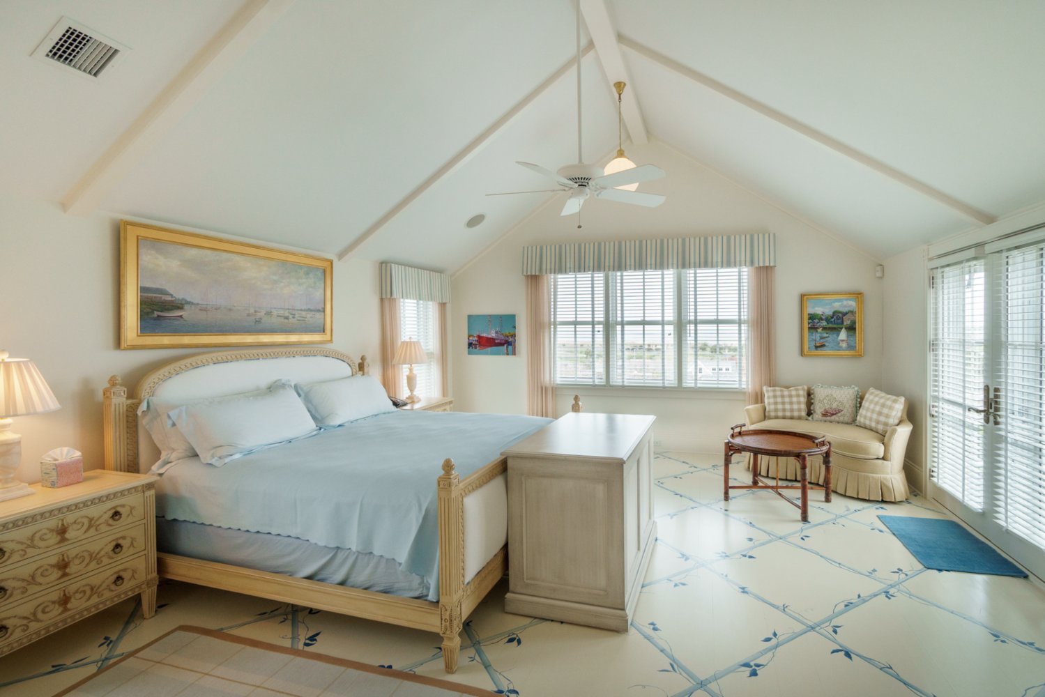 The primary en-suite bedroom has vaulted ceilings and a private deck.