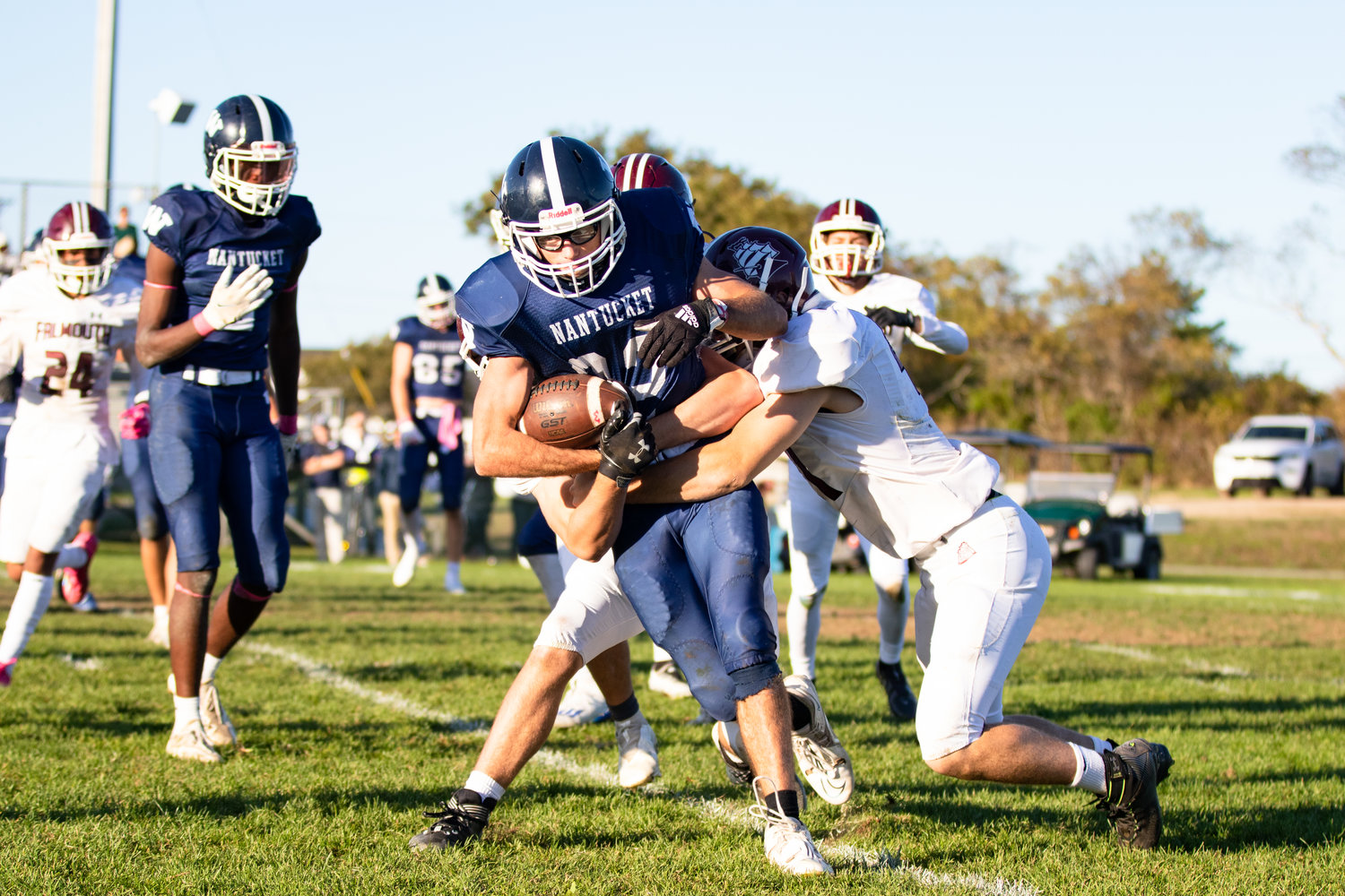Griffin Fox carries the ball against Falmouth.